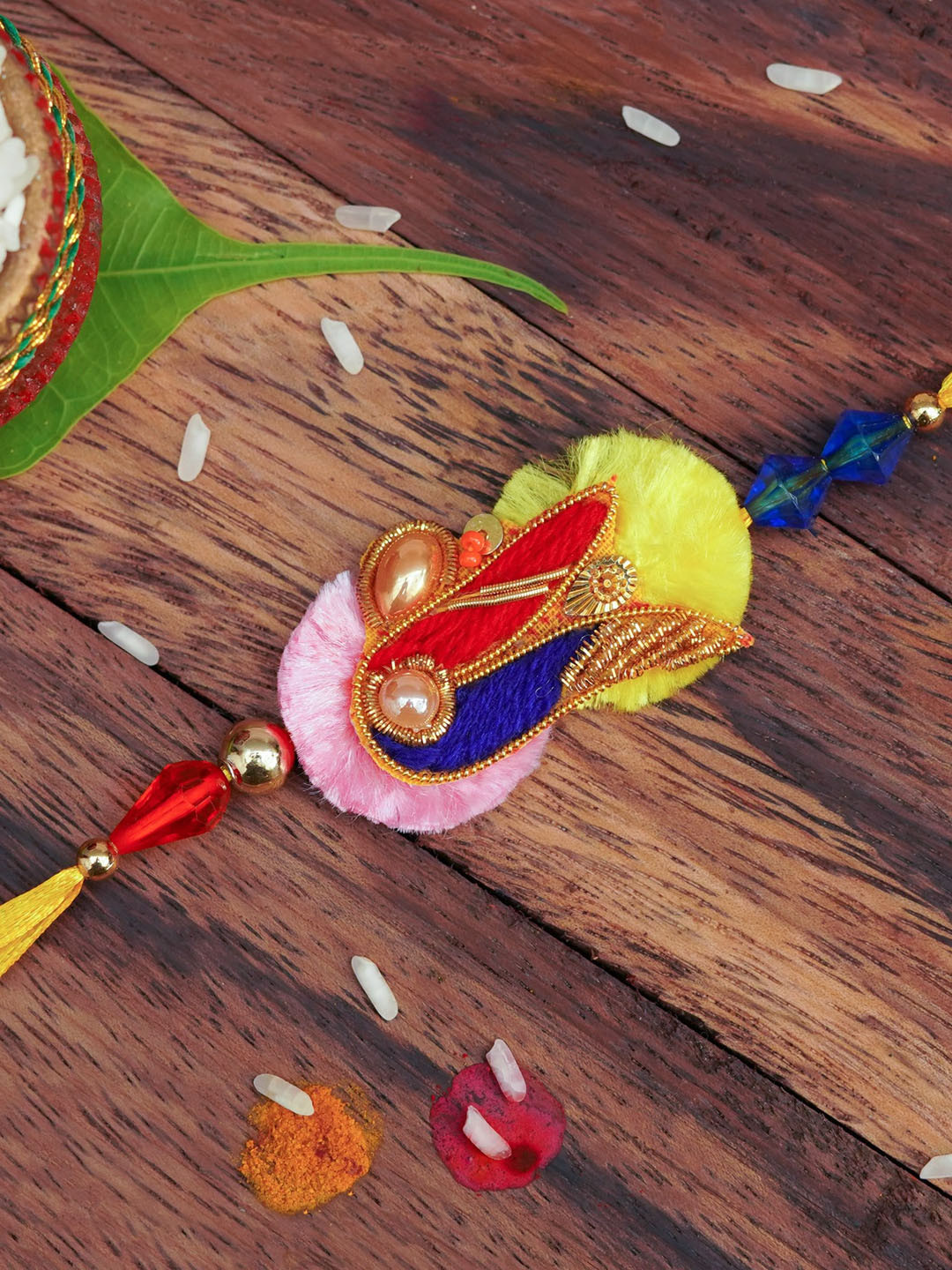 

The Magic Wand Red & Blue Beaded Thread Rakhi