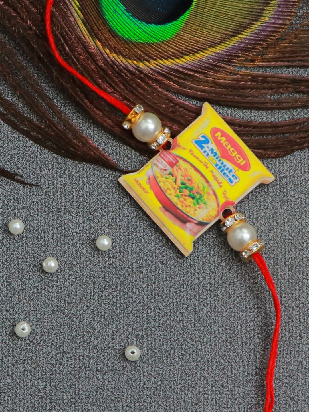 

The Magic Wand Yellow & Red Beaded Maggi Thread Rakhi