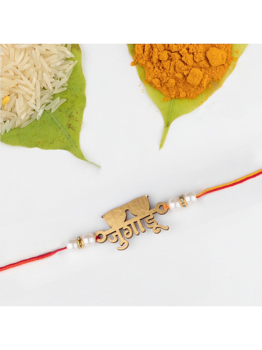 

The Magic Wand Gold-Colored & Red Jugadu Beaded Thread Rakhi
