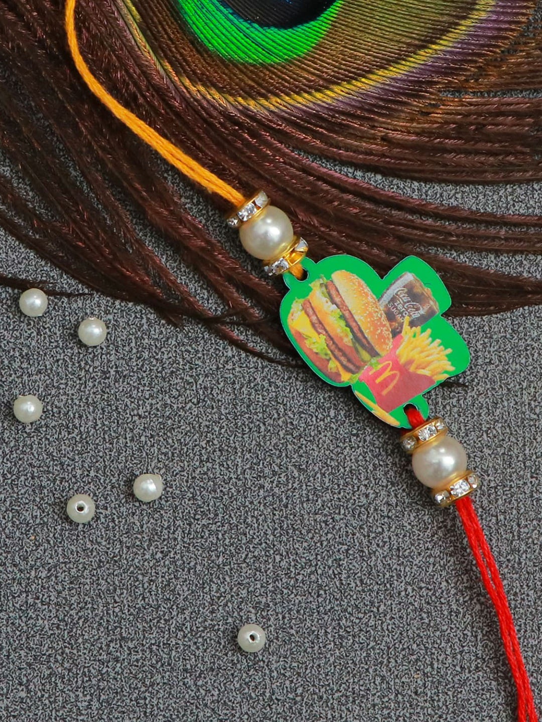 

The Magic Wand Green & Red Burger Beaded Thread Rakhi