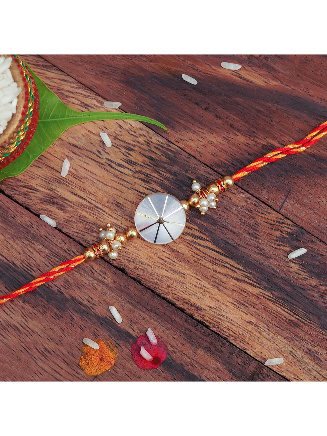 

The Magic Wand Red & White Beaded Thread Rakhi