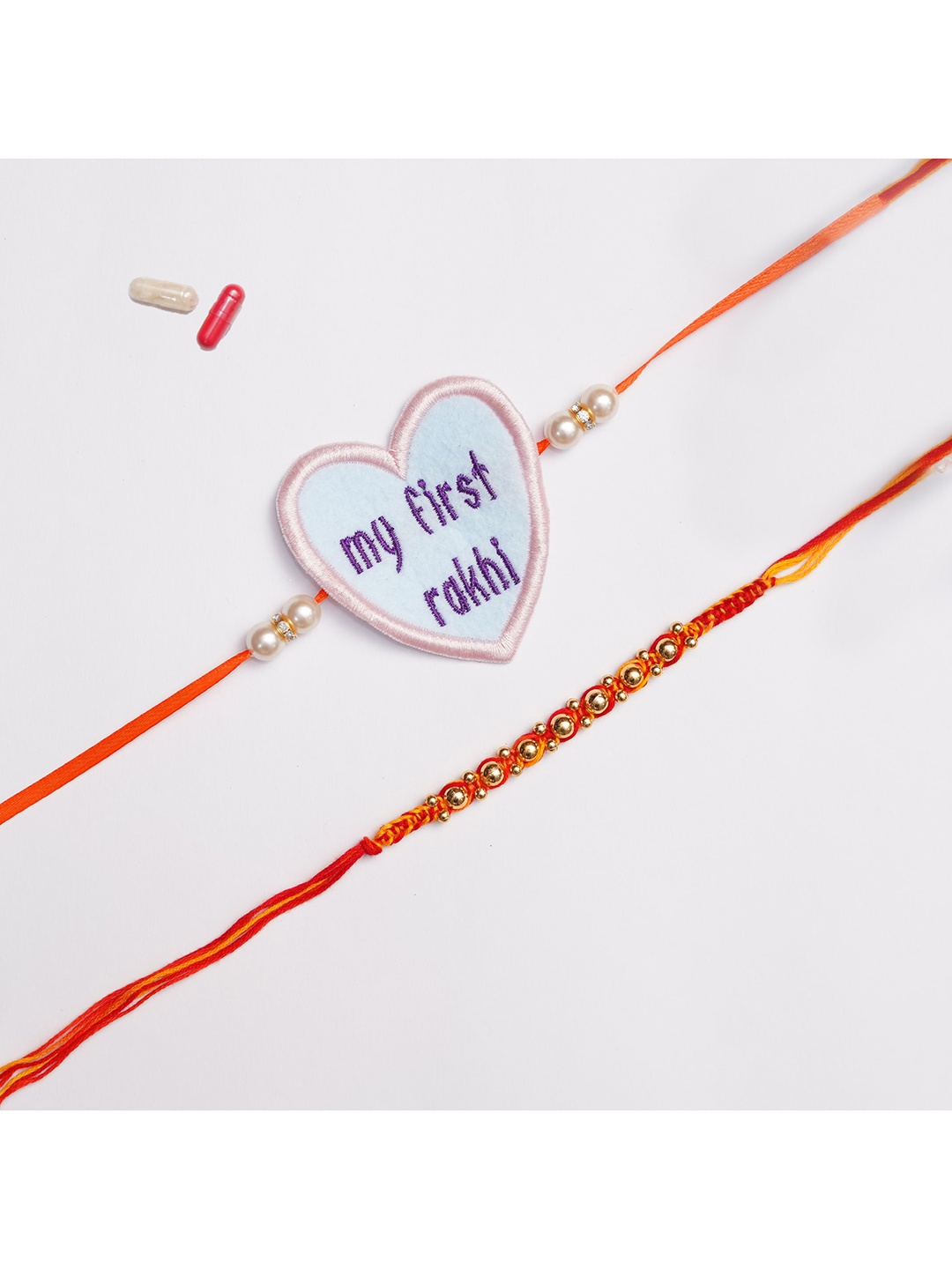 

The Magic Wand Boys Set Of 2 Red & Gold-Toned Applique Rakhis