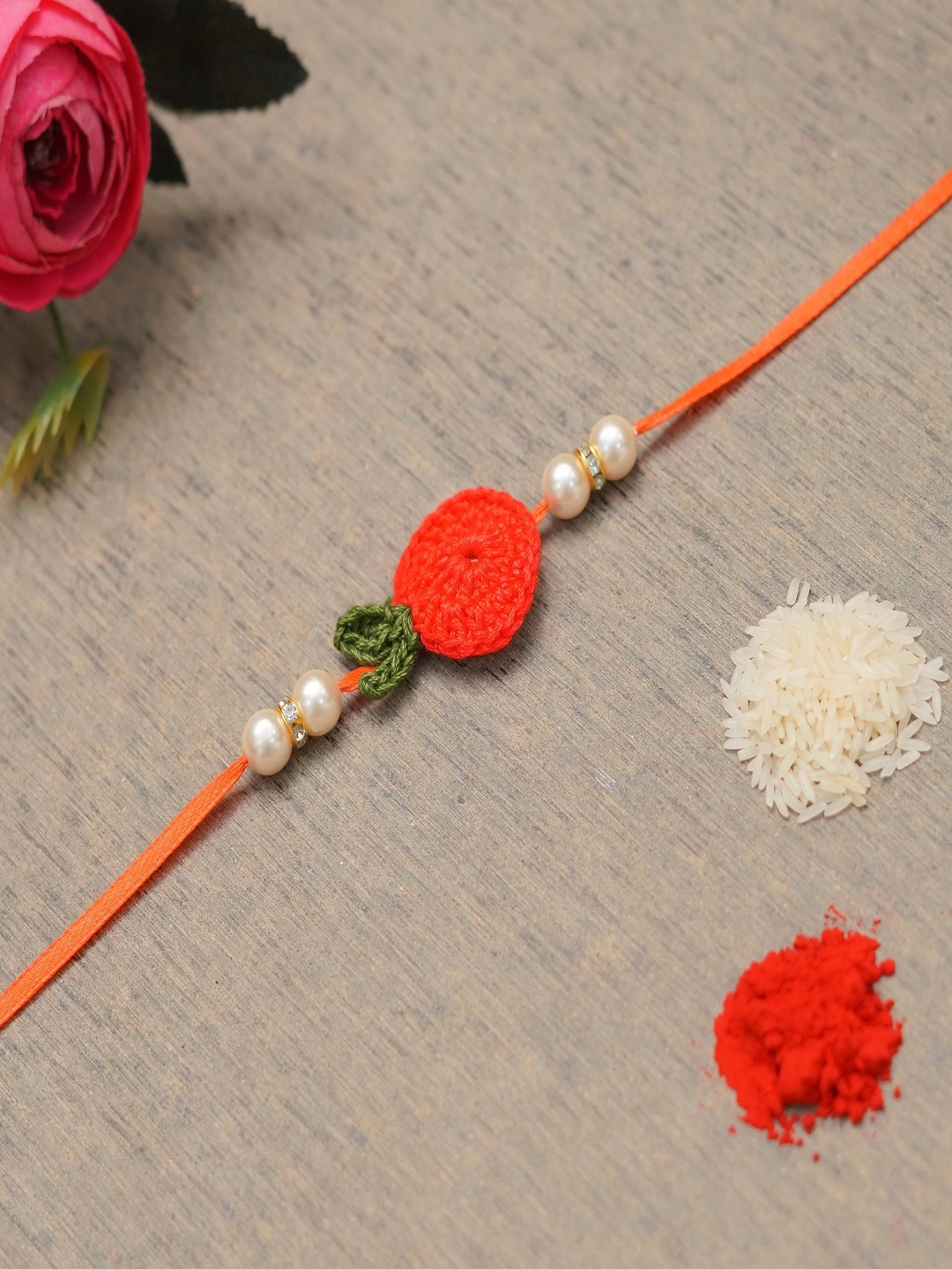 

The Magic Wand Orange & White Beaded Thread Rakhi