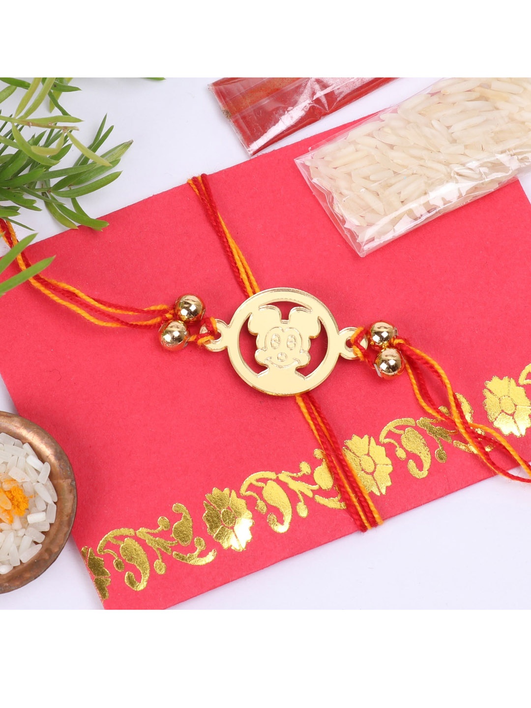 

The Magic Wand Gold-Coloured & Red Mickey Mouse Beaded Thread Rakhi