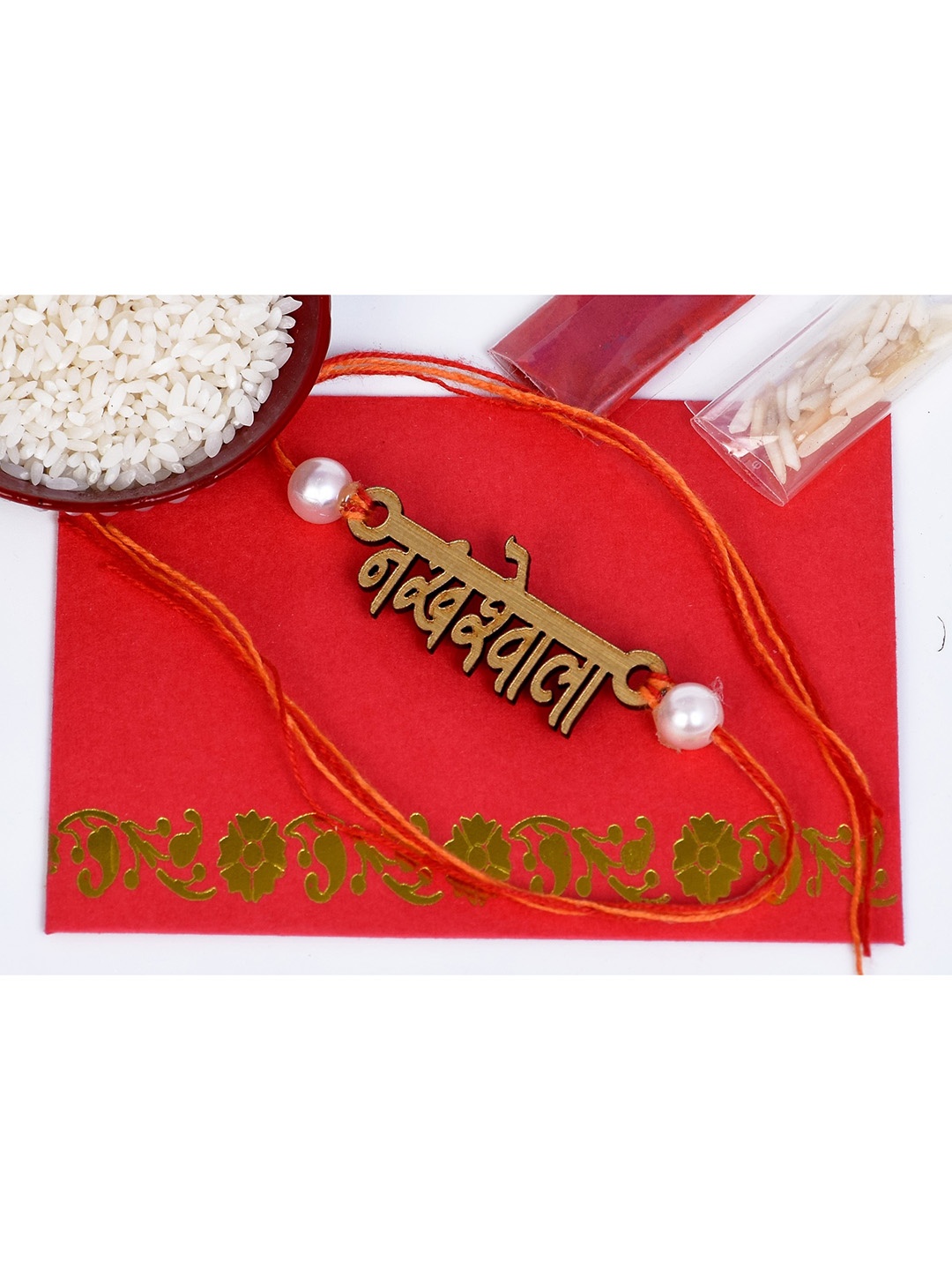 

The Magic Wand Gold Coloured & Red Nakhrewala Thread Rakhi