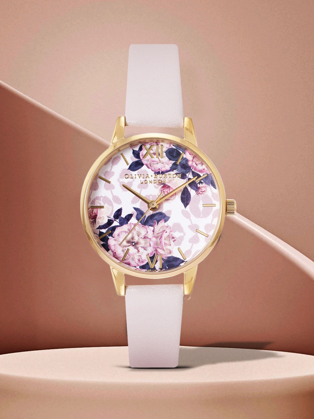

OLIVIA BURTON LONDON Women White Floral Dial & Pink Leather Strap Analogue Watch OB16LP02