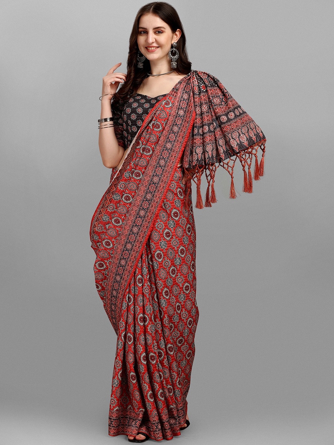 

Fashionuma Red & Black Ethnic Motifs Silk Blend Saree