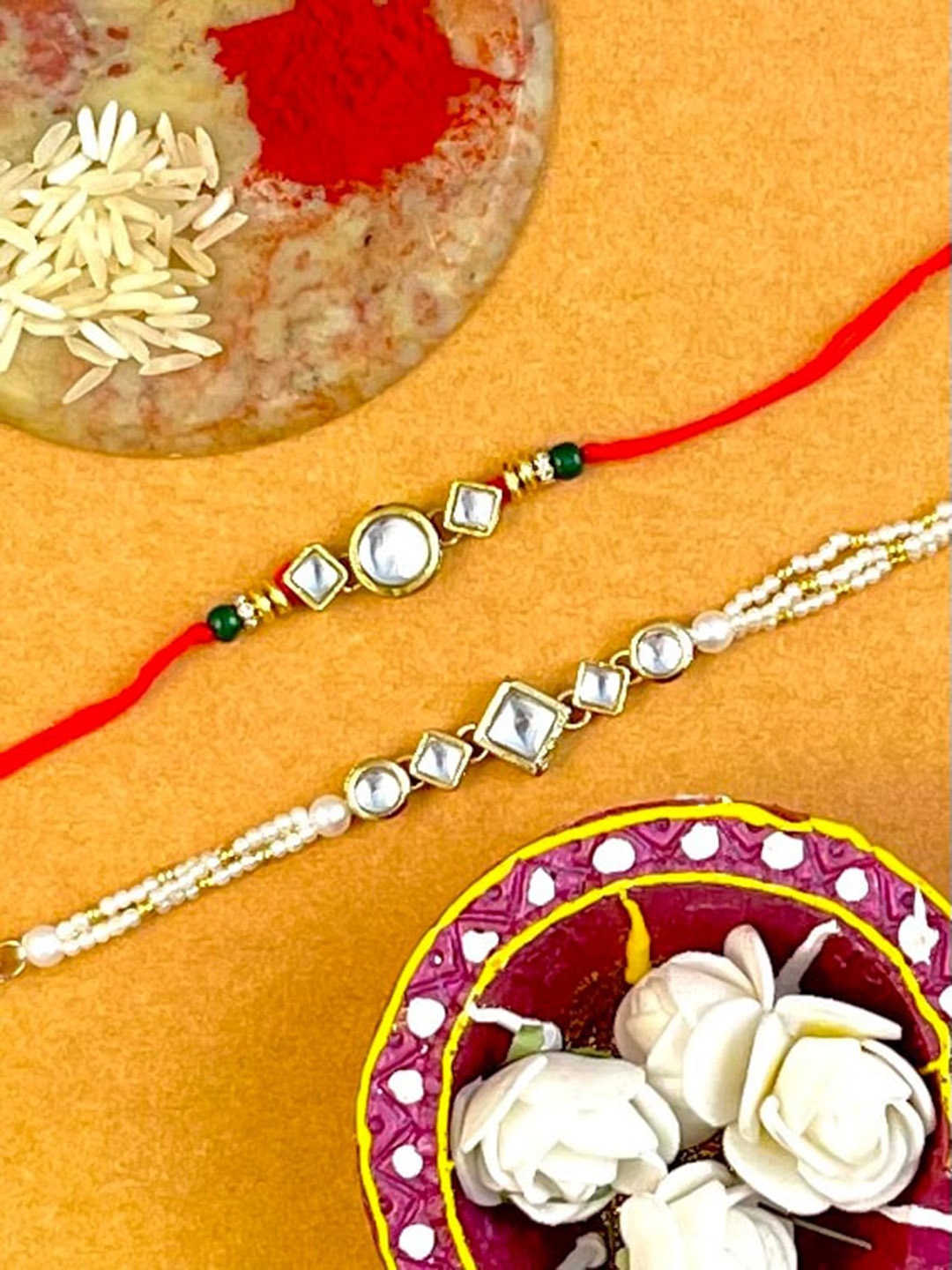 

KARATCART Gold Plated Kundan Bhaiya Bhabhi Rakhi Combo with Roli & Chawal