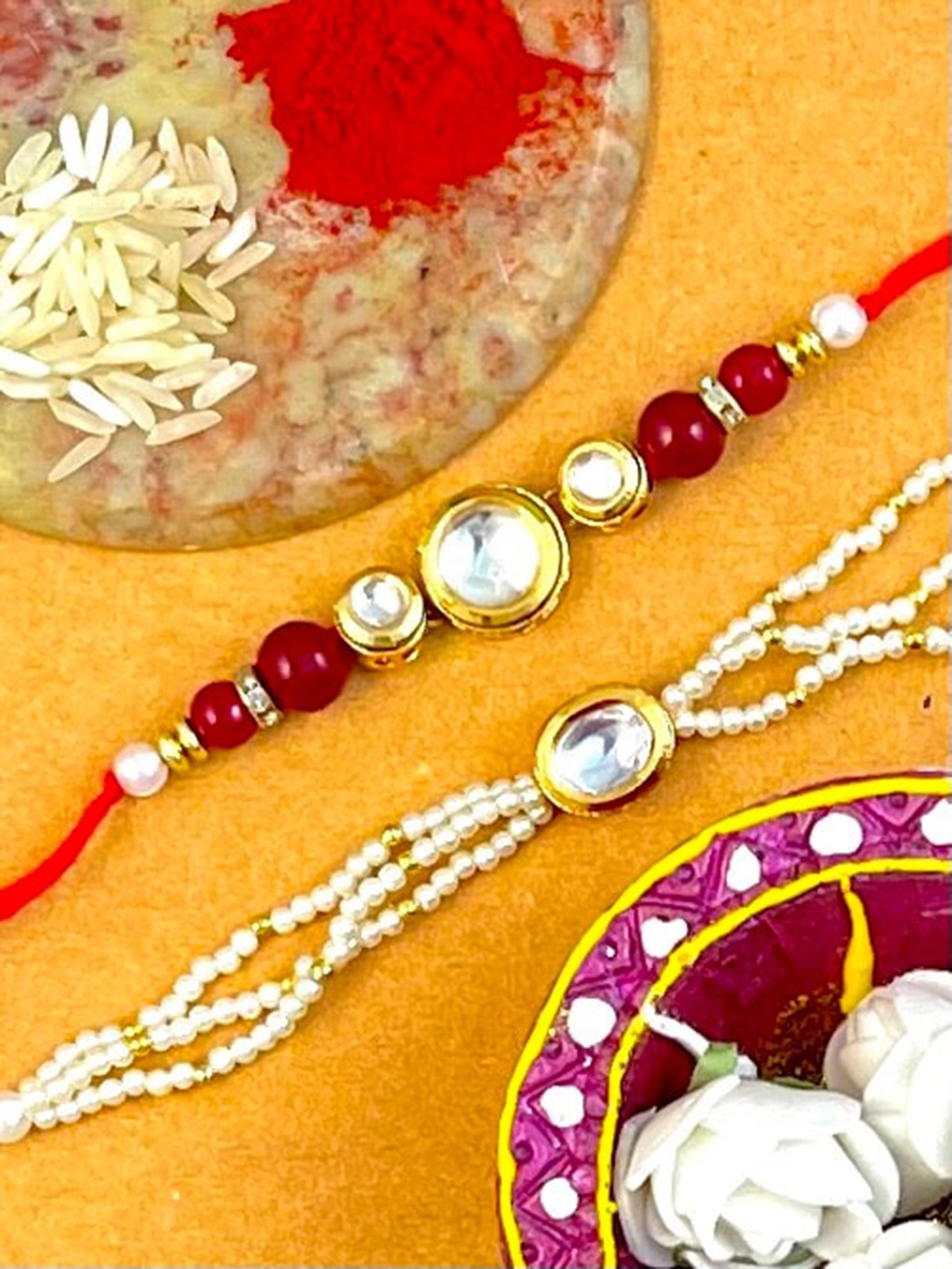 

KARATCART Men Red & Gold-Toned & Plated Stone-Studded Bhaiya & Bhabhi Rakhi