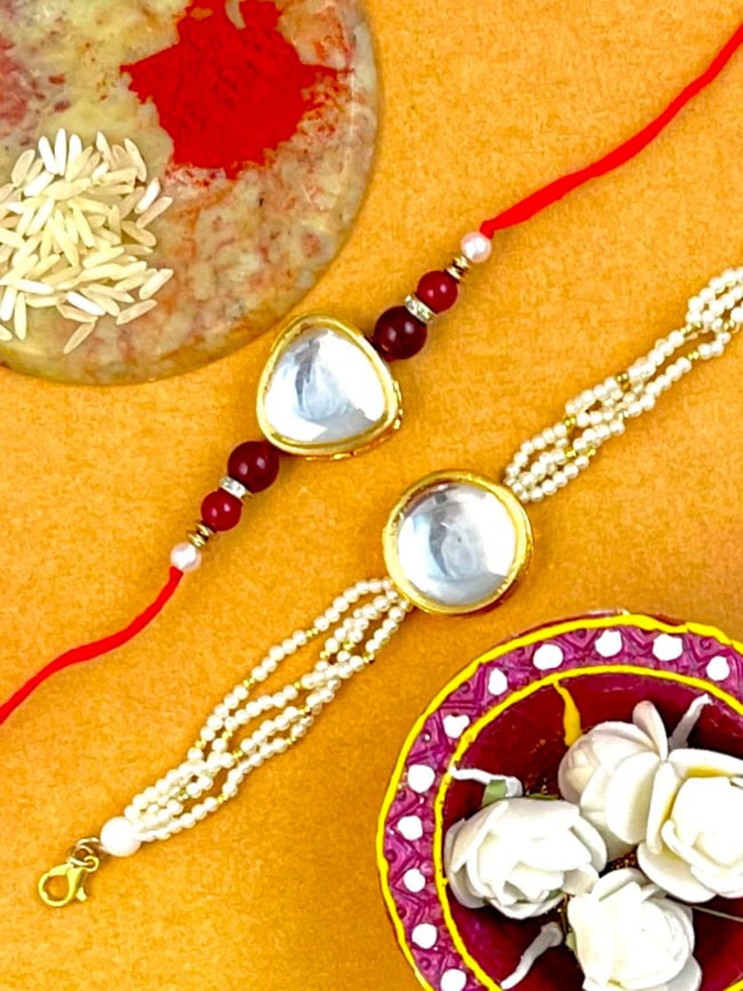

KARATCART Red & Gold-Toned & Plated Stone-Studded Bhaiya & Bhabhi Rakhi