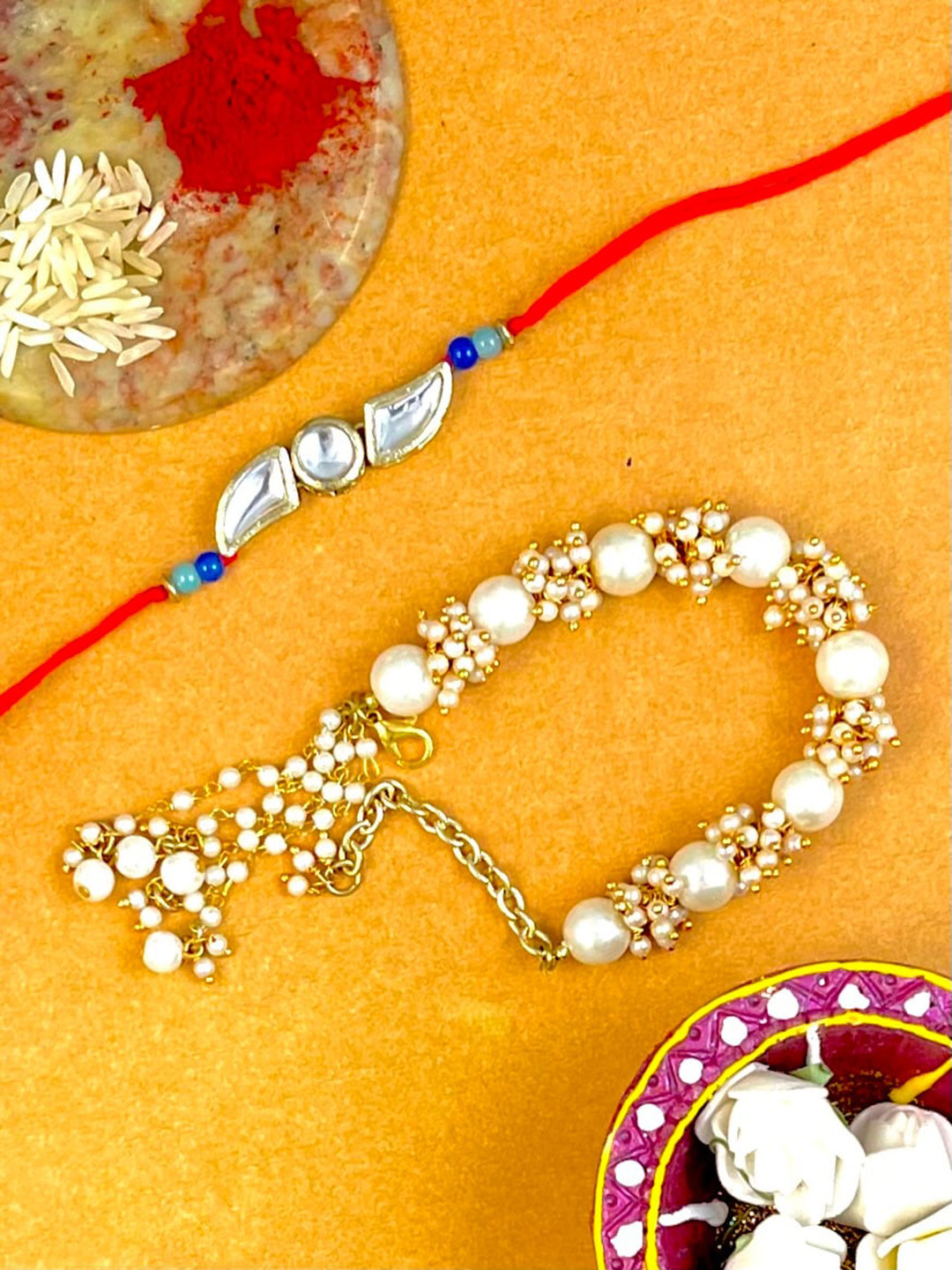 

KARATCART Set Of 2 Gold-Plated White & Red Kundan-Studded & Beaded Rakhi & Lumba
