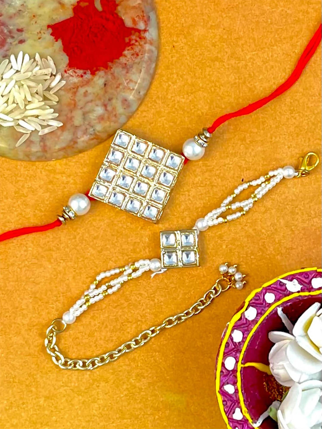 

KARATCART Gold Plated Kundan Bhaiya Bhabhi Rakhi Combo with Roli & Chawal