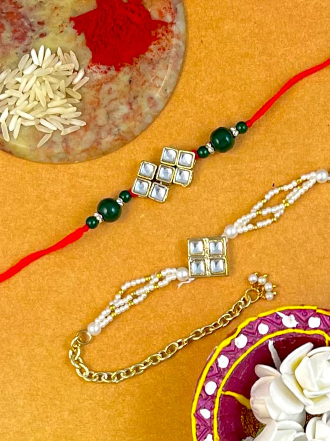 

KARATCART Set Of 2 Gold-Plated Kundan Studded Rakhi & Lumba