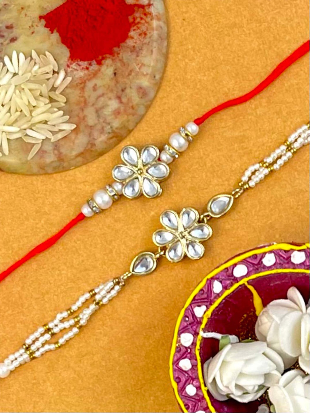 

KARATCART Set Of 2 Gold-Plated White Kundan Studded Thread Rakhi