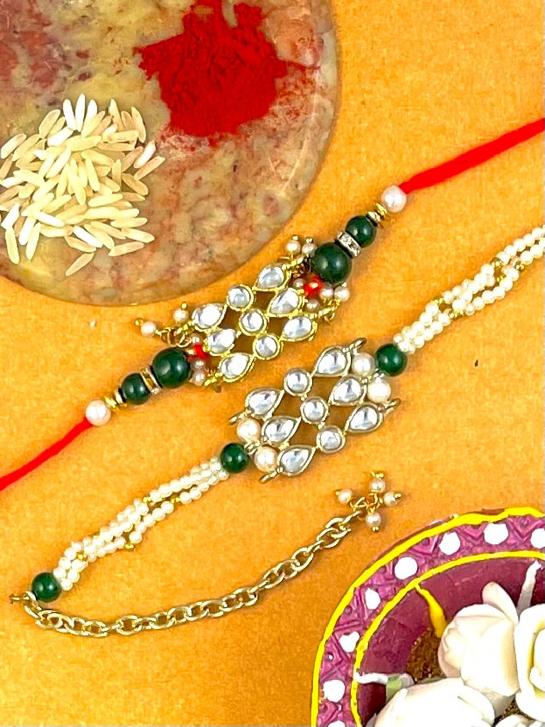 

KARATCART Men Set of 2 Gold-Plated Red & White Kundan Studded & Beaded Rakhi