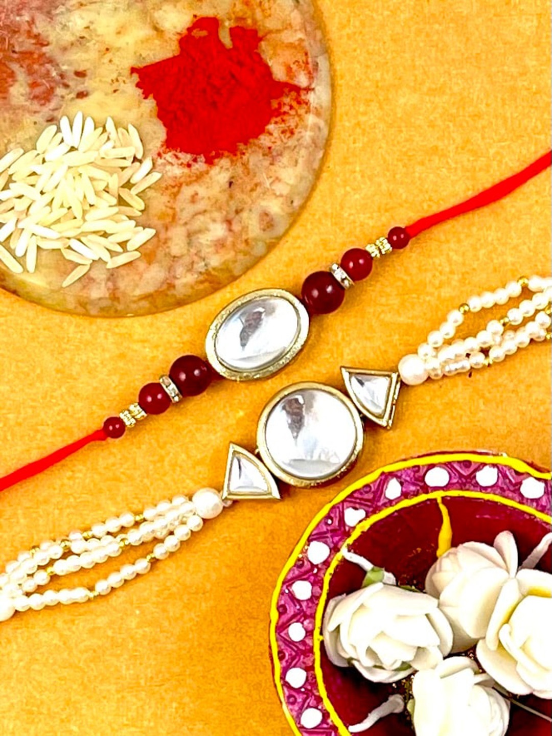 

KARATCART Pack Of 2 Gold-Plated Kundan Studded Rakhi & Lumba