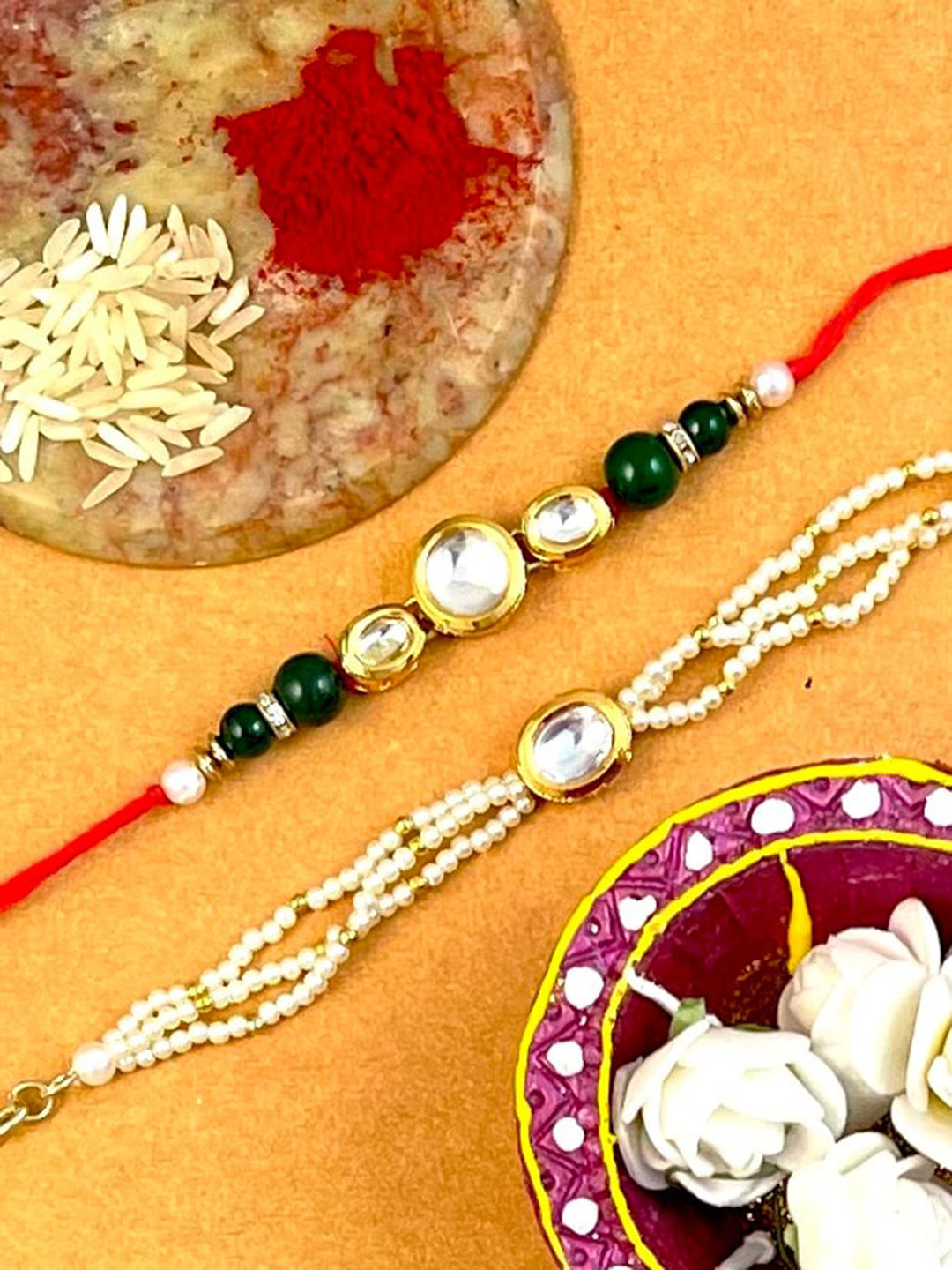 

KARATCART Set Of 2 Gold-Plated White Kundan Studded Thread Rakhi