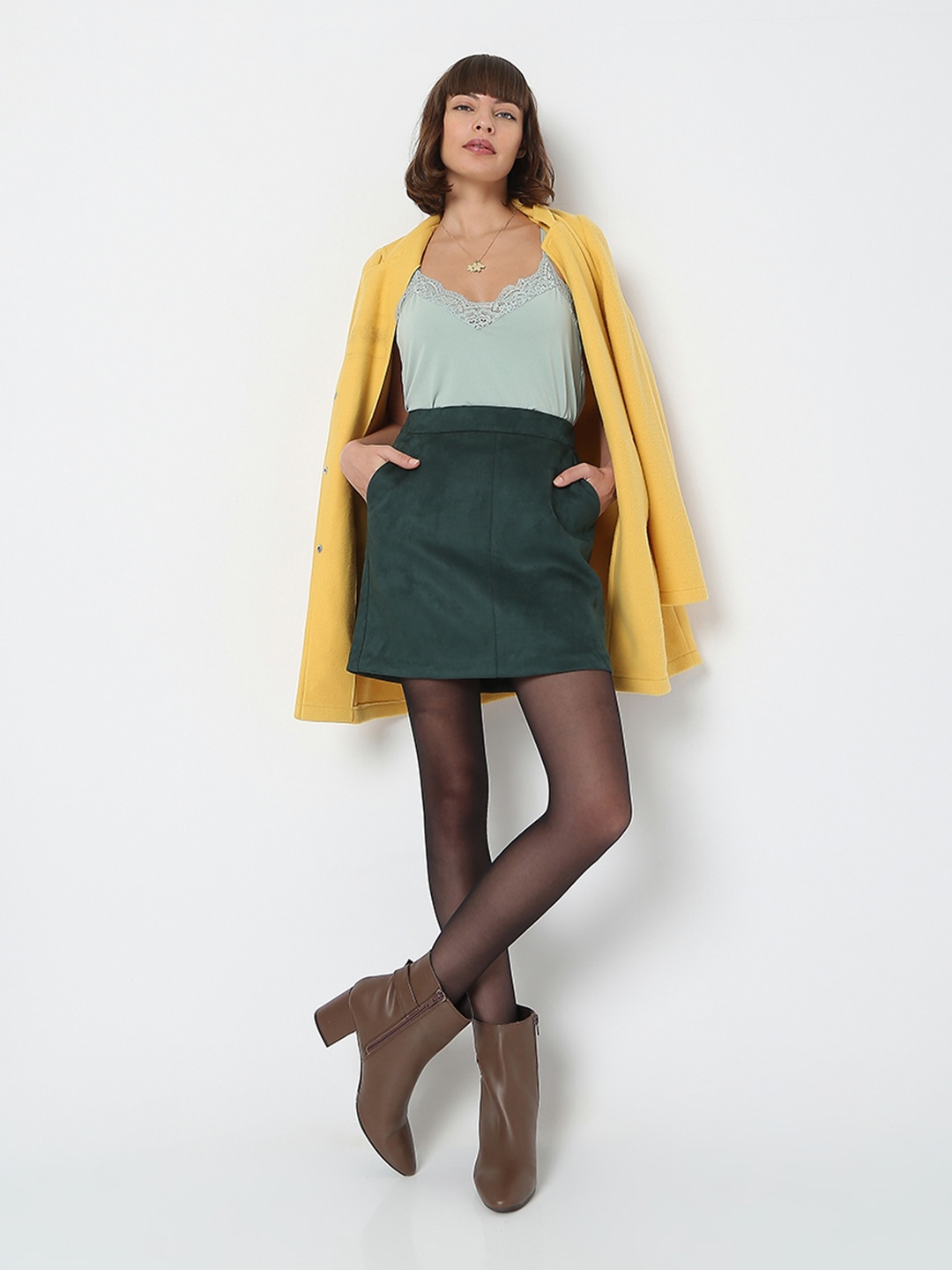 

Vero Moda Women Green Solid Straight Mini Skirt