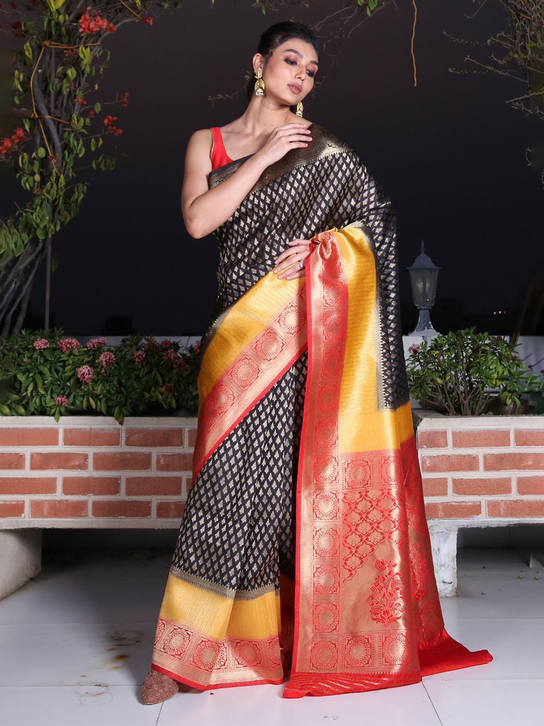

Charukriti Black & Gold-Toned Ethnic Motifs Print Woven Design Zari Brocade Saree