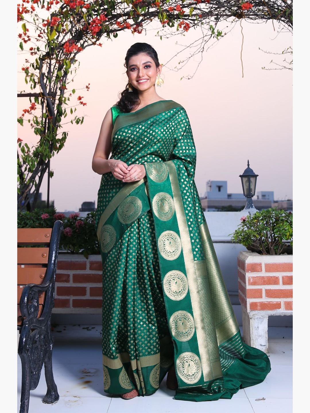 

Charukriti Green & Silver-Toned Ethnic Motifs Woven Design Zari Brocade Saree