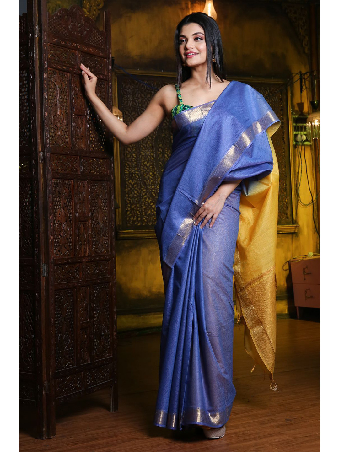 

Charukriti Blue & Gold-Toned Ethnic Motifs Zari Silk Blend Saree