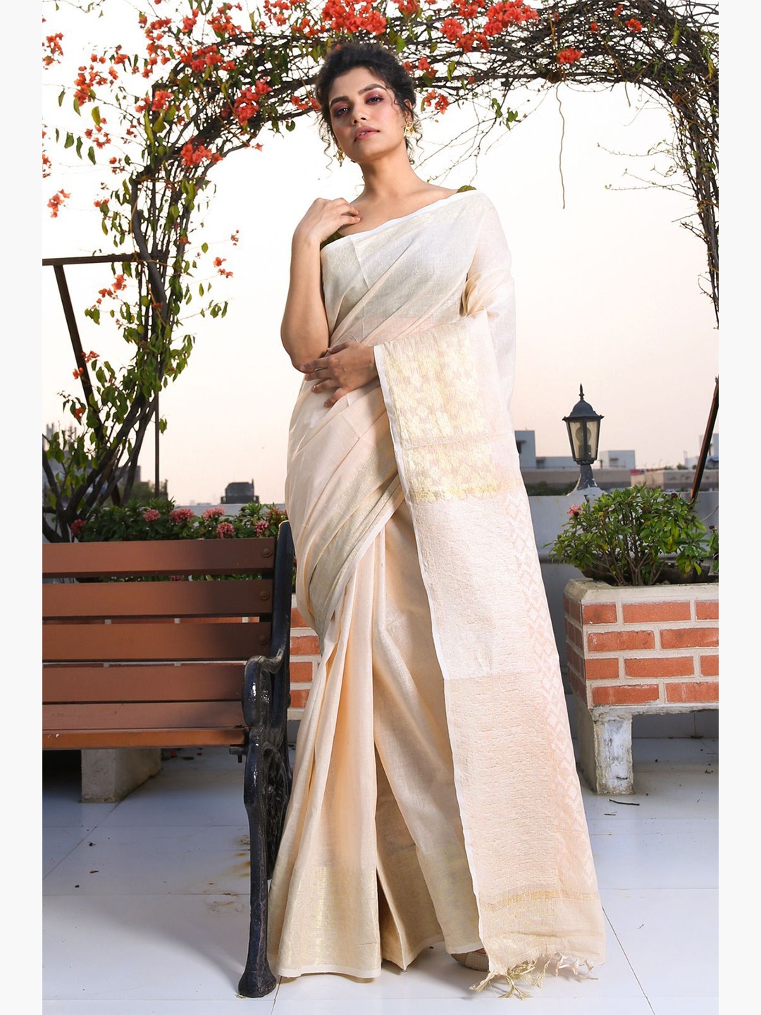 

Charukriti White & Gold-Toned Woven Design Saree