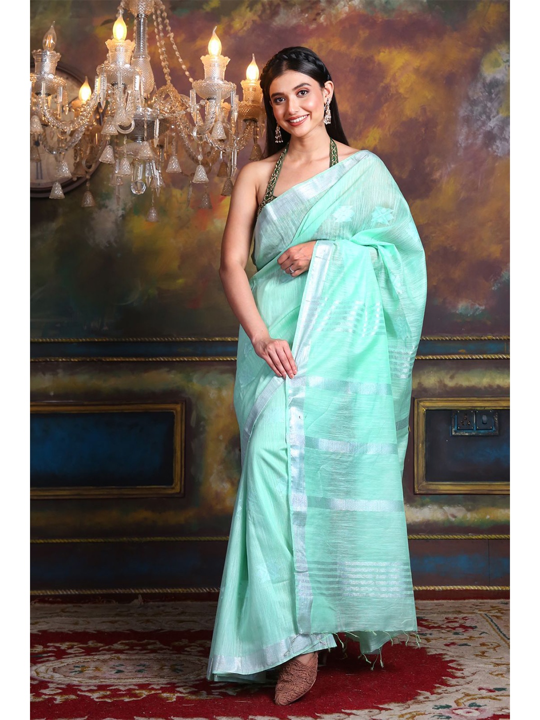 

Charukriti Green & Silver-Toned Woven Design Zari Silk Blend Saree