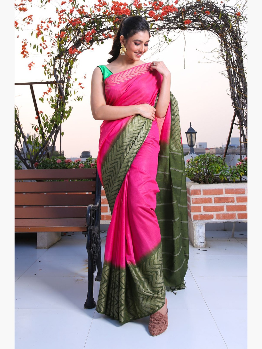 

Charukriti Pink & Green Woven Design Zari Silk Blend Saree