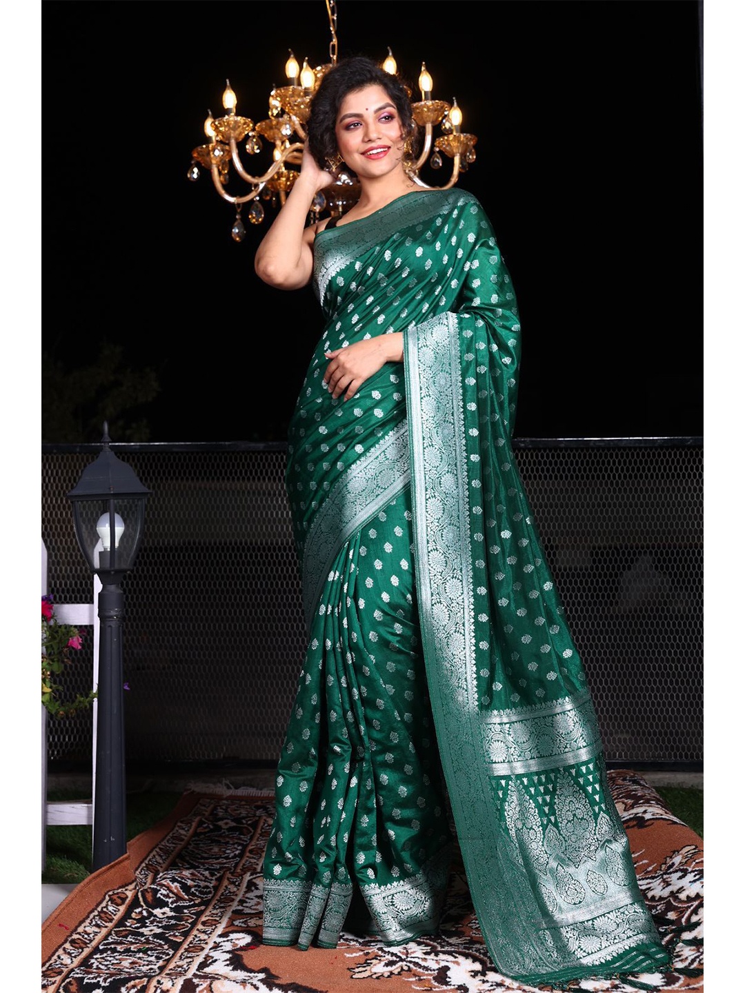 

Charukriti Green & Silver-Toned Ethnic Motifs Zari Brocade Saree