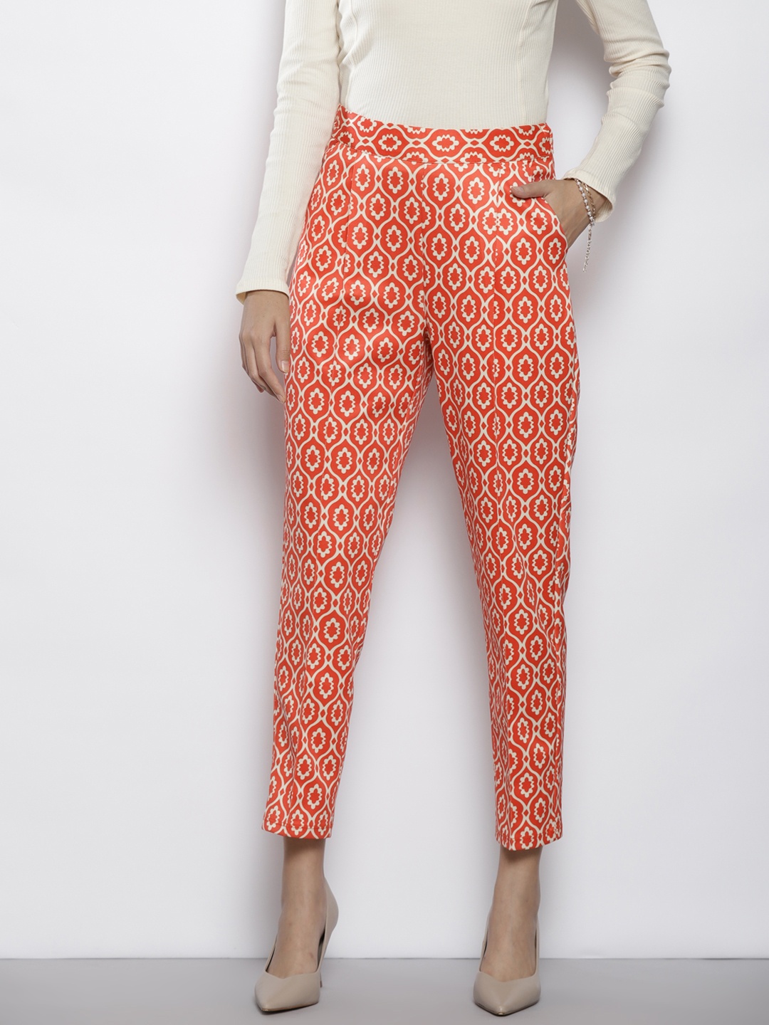 

SASSAFRAS Women Rust Ethnic Motifs Printed Comfort Tapered Fit Trousers