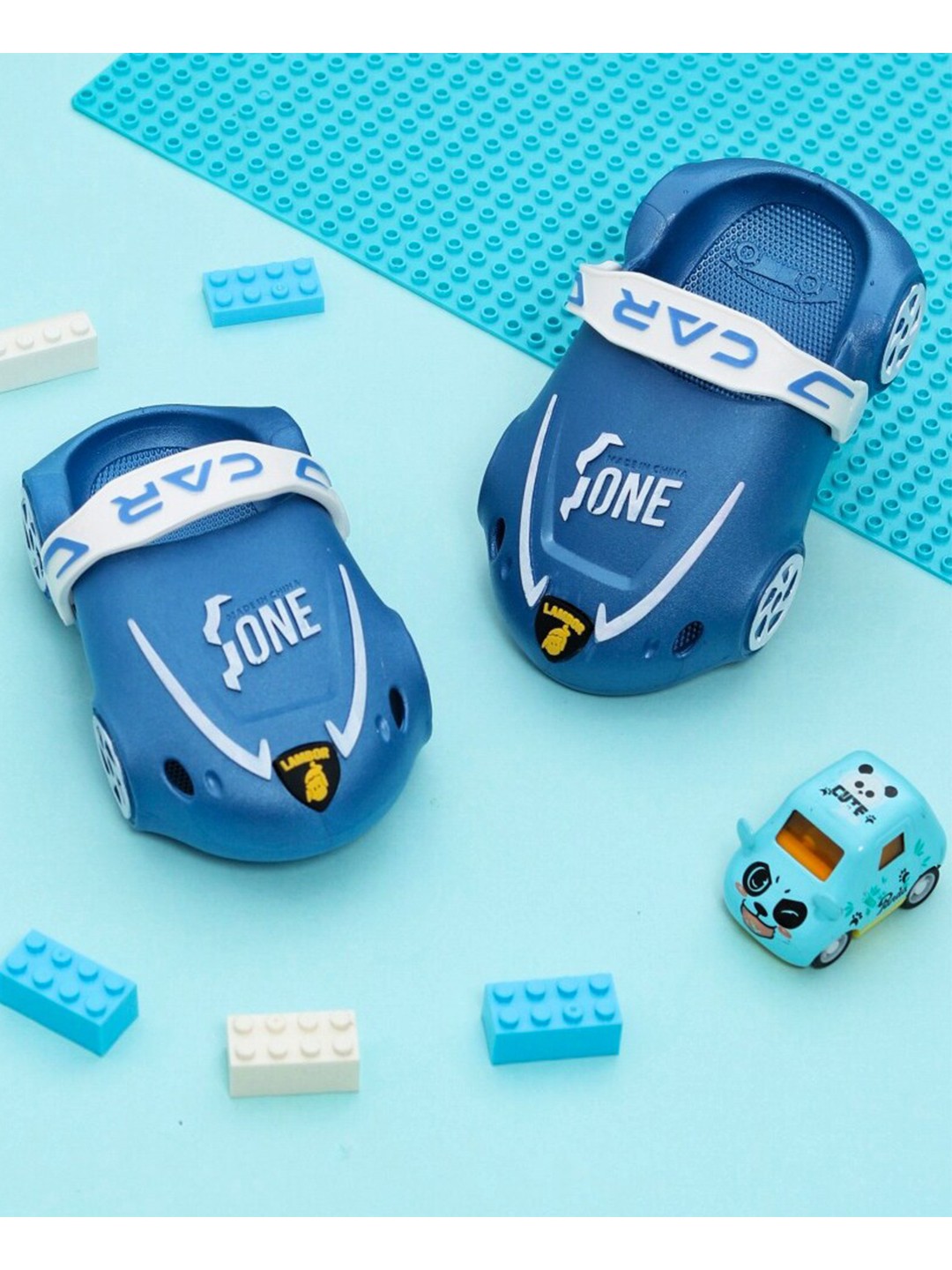 

Yellow Bee Boys Blue & White Clogs Sandals