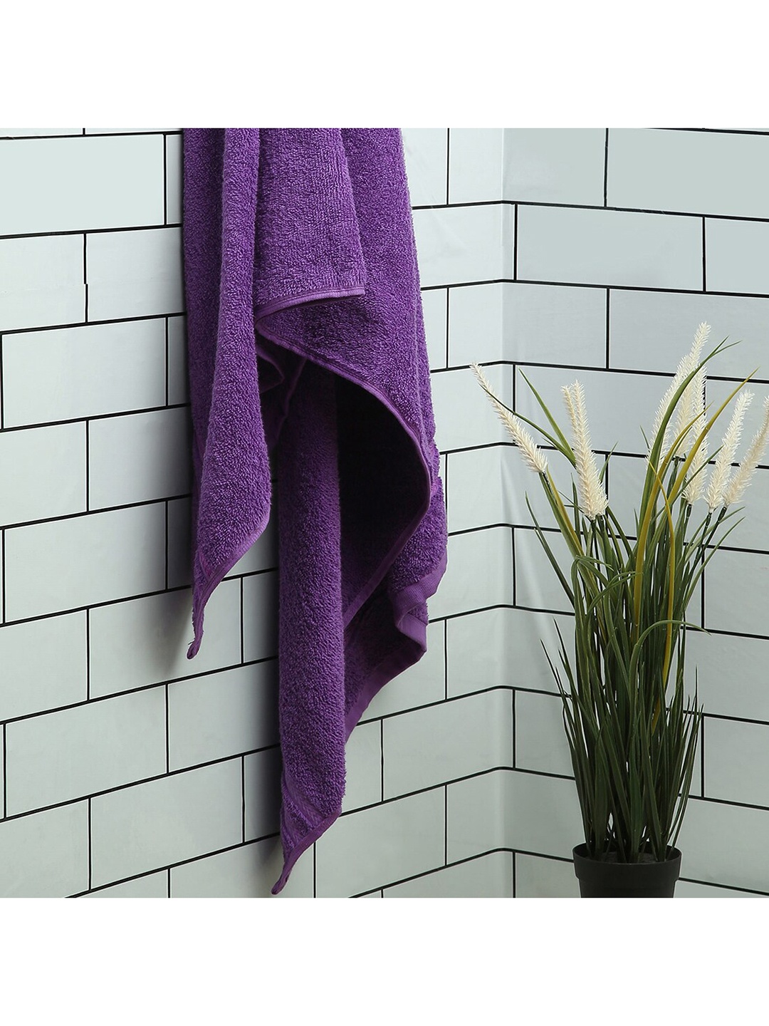 

Welspun Purple Solid Super Absorbent Pure Cotton Bath Towel