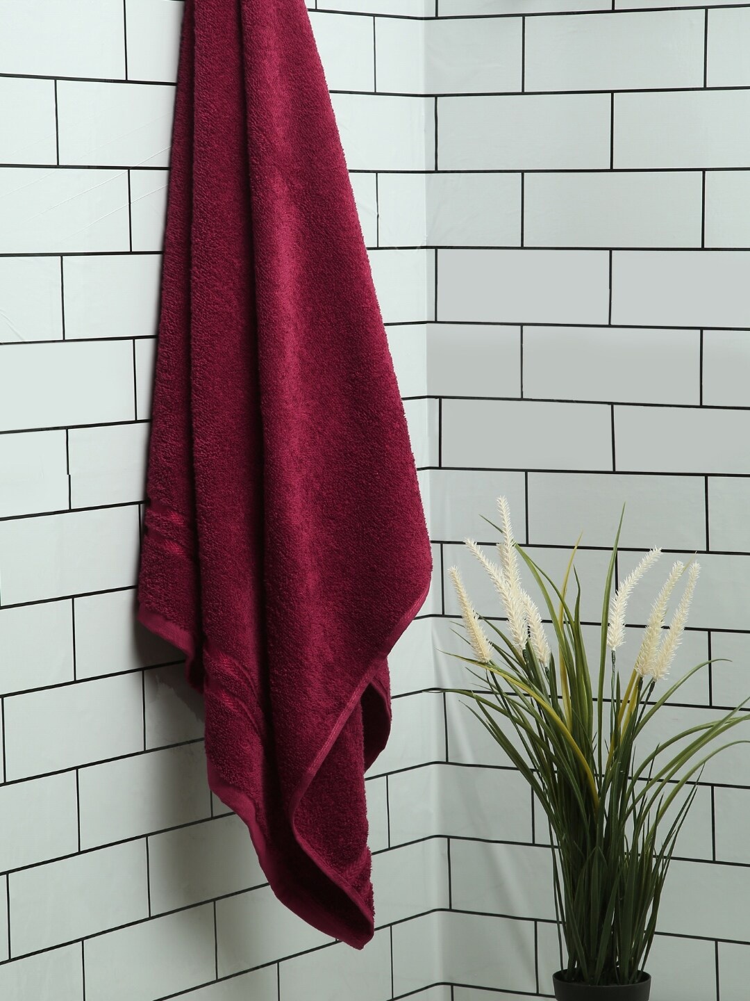 

Welspun Maroon 380 GSM Quick Dry High Absorbent Pure Cotton Bath Towel