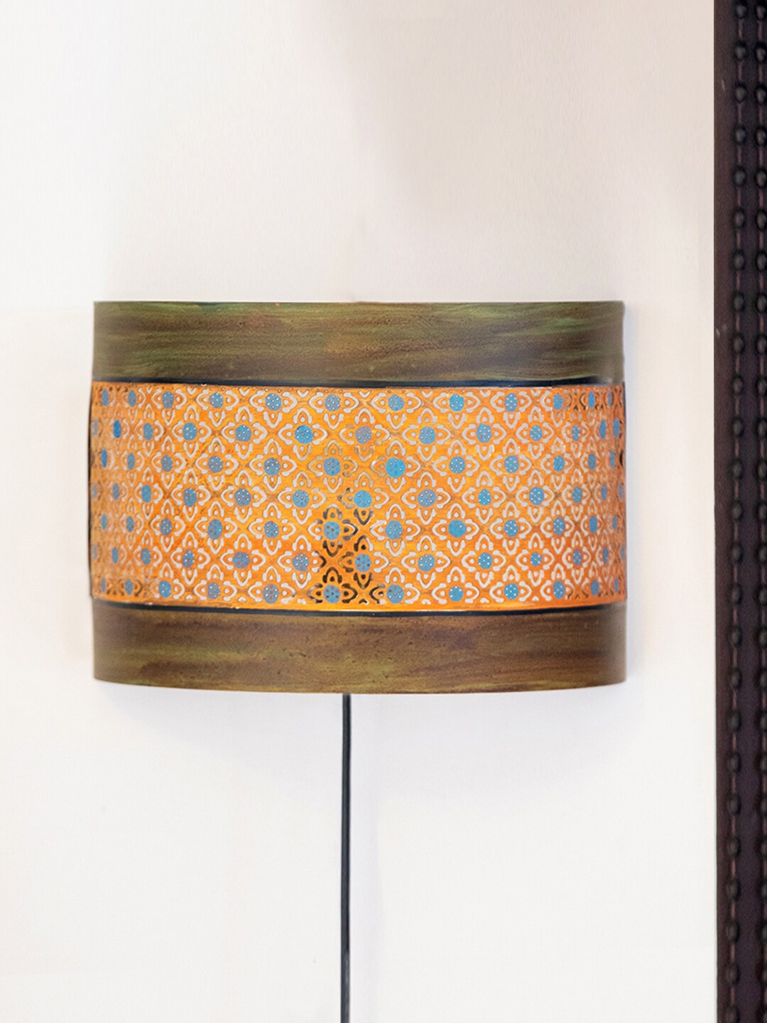 

ExclusiveLane Brown & Yellow Crocheted Floret Printed Metal Wall Lamp