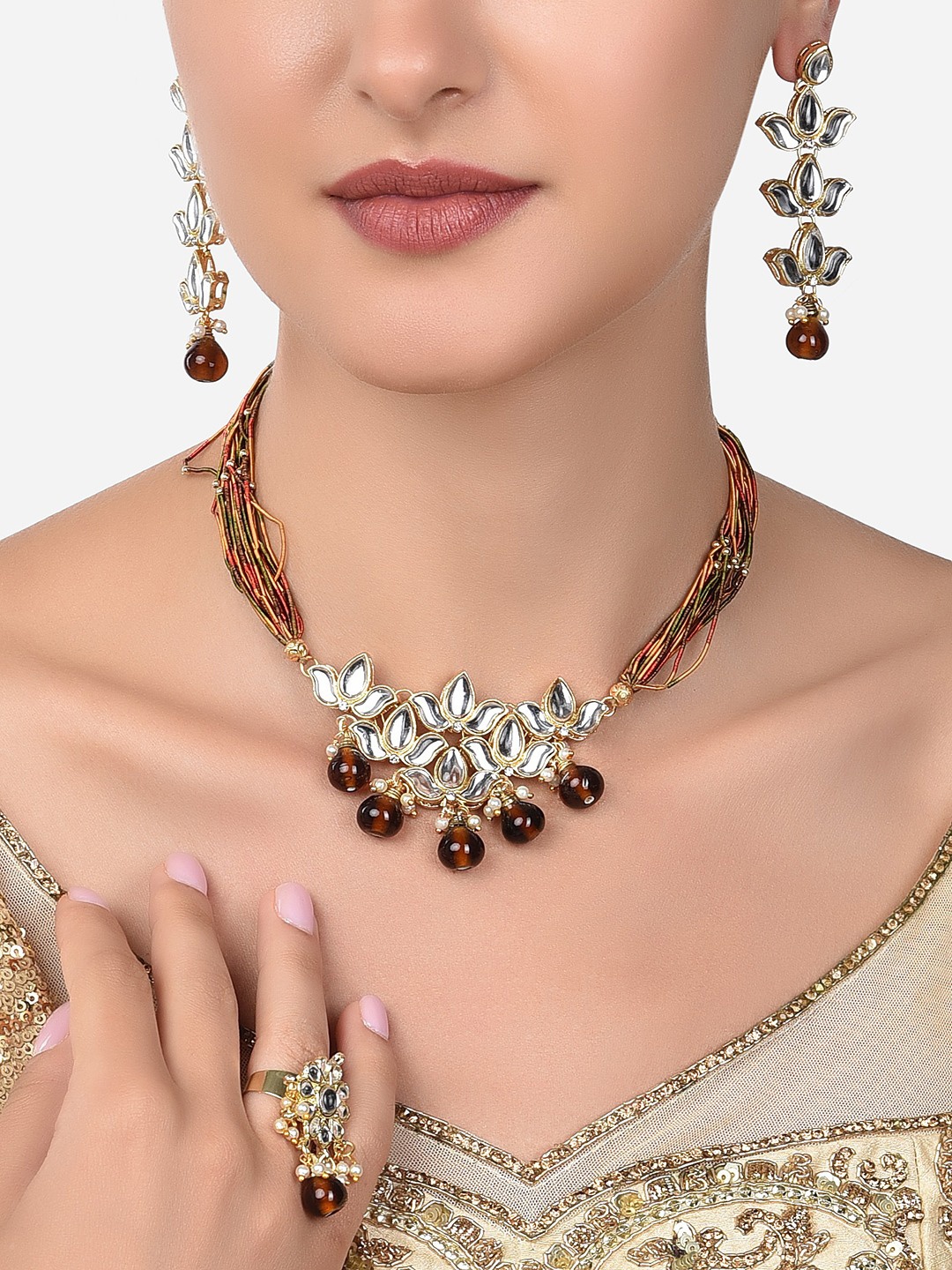 

Zaveri Pearls Gold-Plated & White Kundan Studded Multistrand Jewellery Set