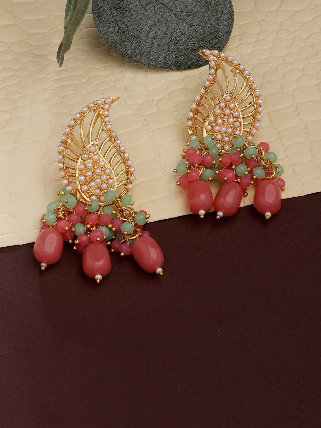 

Zaveri Pearls Pink & Gold-Toned Contemporary Jhumkas Earrings