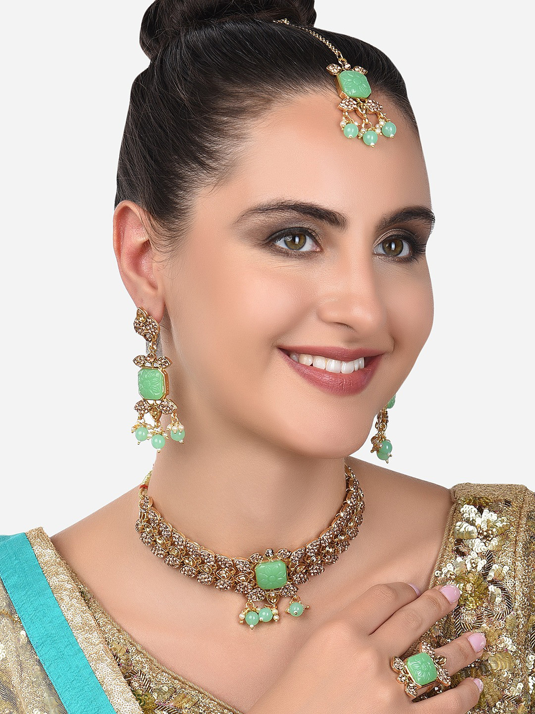 

Zaveri Pearls Gold-Plated Green & Pink Stone Studded & Beaded Jewellery Set
