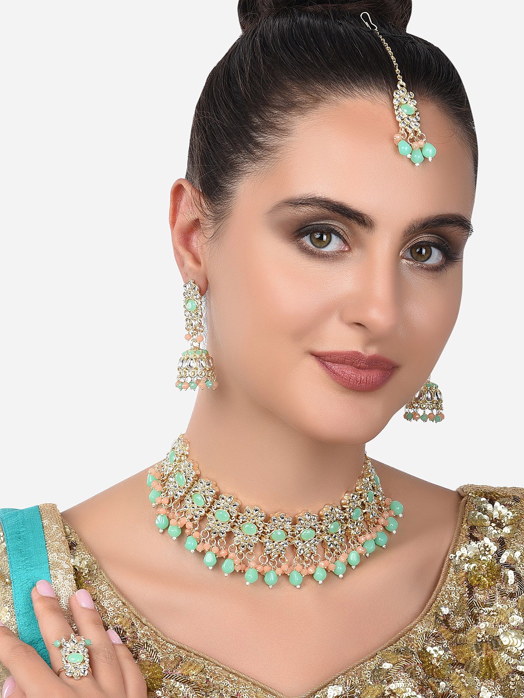 

Zaveri Pearls Gold-Plated Green Kundan Studded Jewelry Set with Mang tikka & Ring