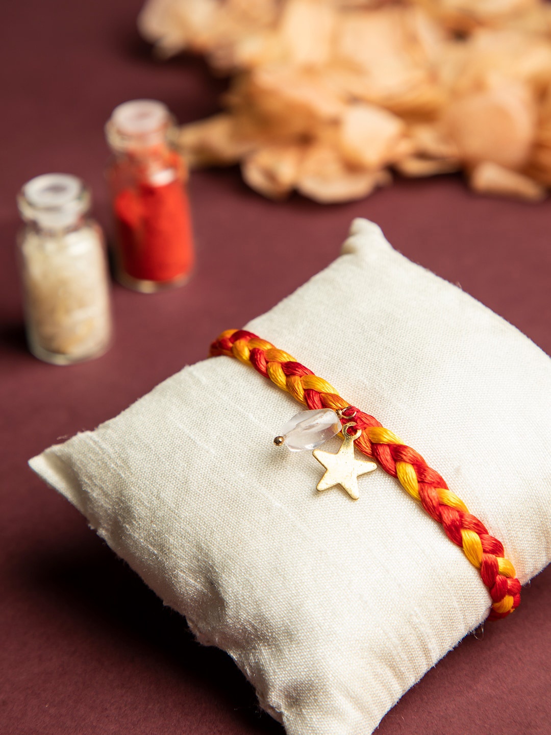 

DEEBACO Red & Transparent Rose Quartz-Studded Rakhi With Roli & Chawal