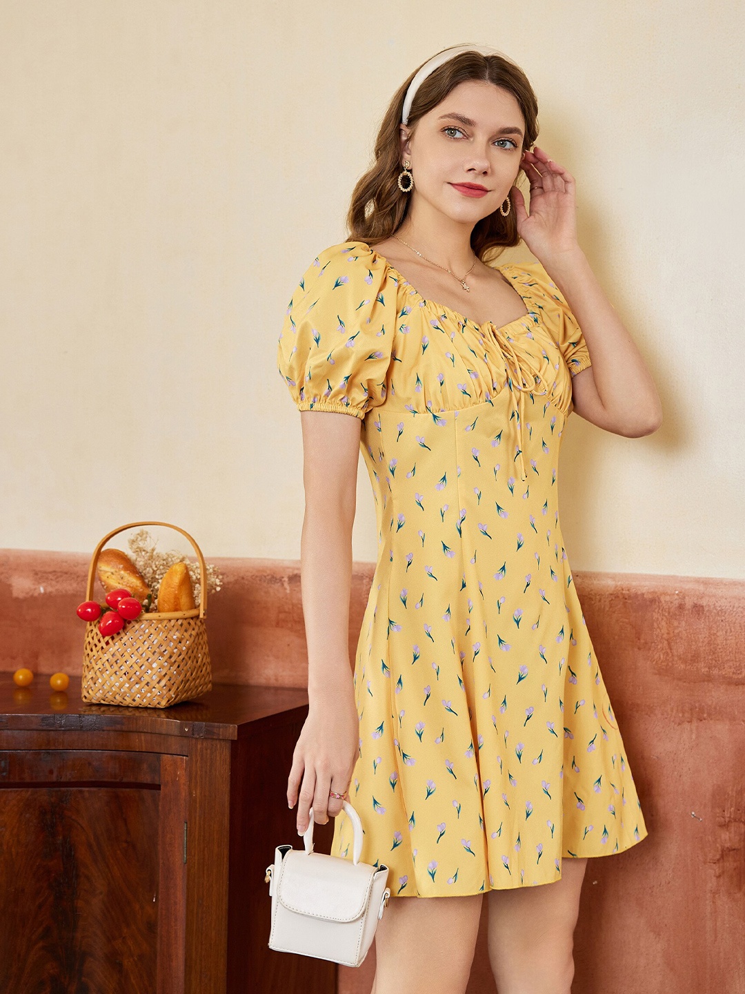 

URBANIC Women Yellow Floral Tie-Up Neck Dress