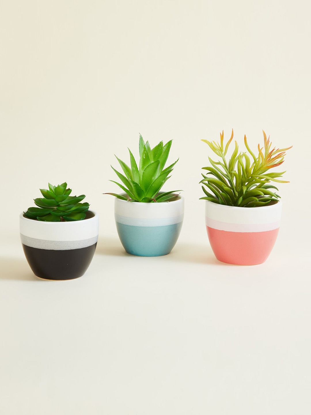 

Home Centre Set of 3 Black ,Blue and Peach Printed Ceramic Floor Planters