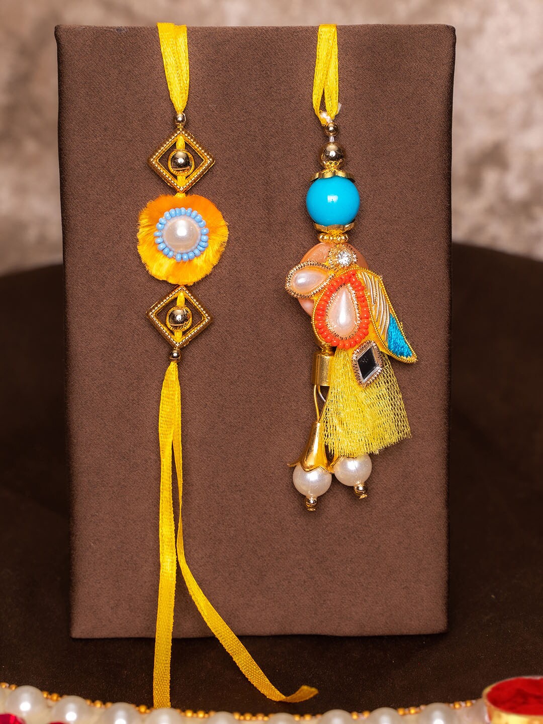 

TIED RIBBONS Bhaiya Bhabhi Rakhi with Card & Roli Chawal, Yellow