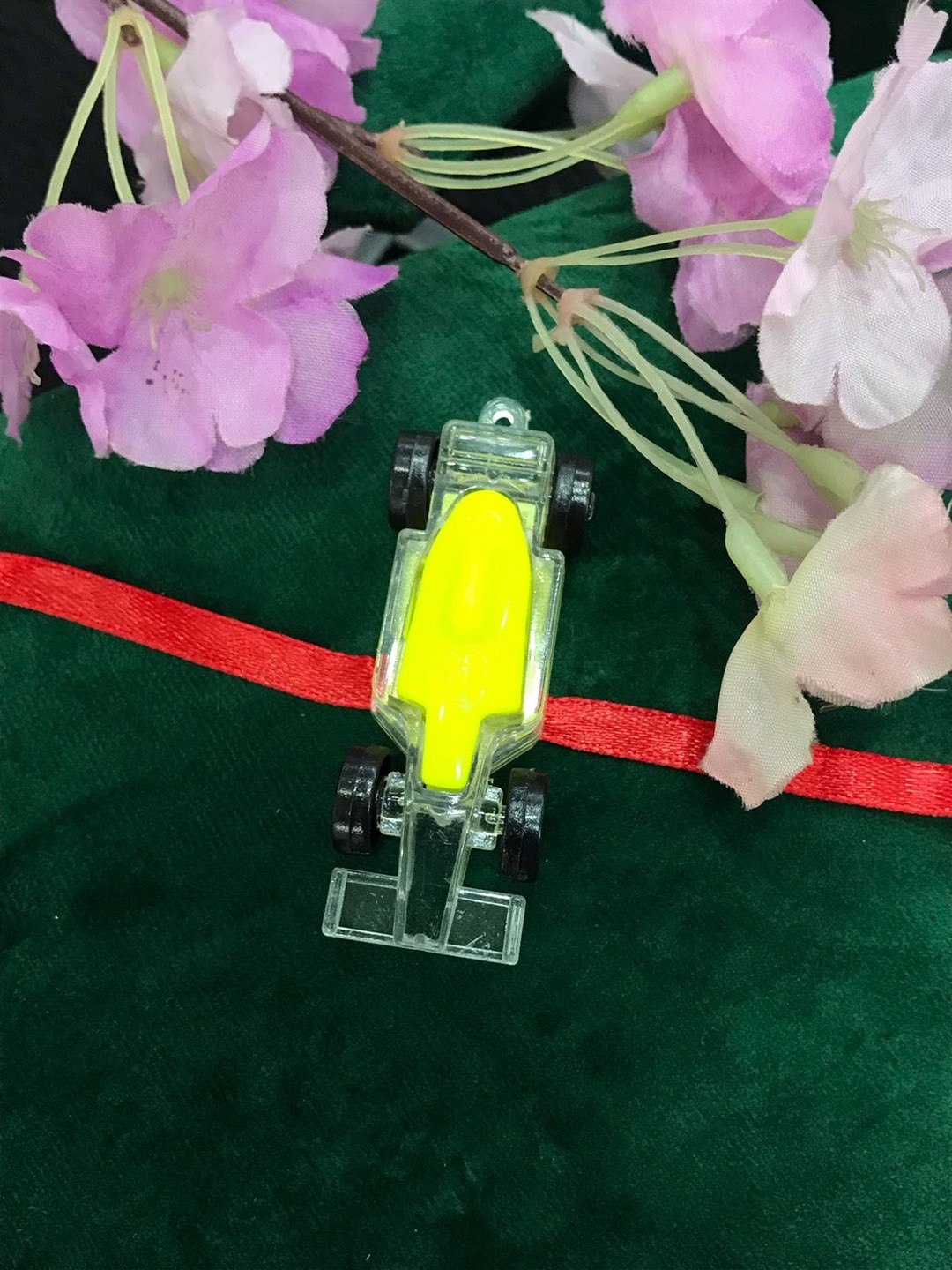

MORKANTH JEWELLERY Yellow Car Light Rakhi