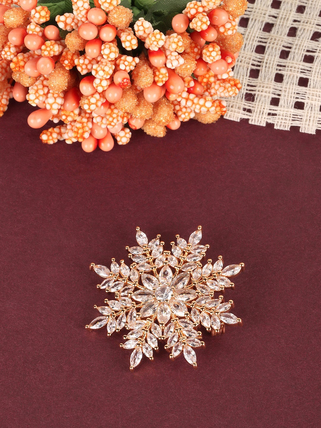 

JEWELS GEHNA Women Gold-Plated White CZ Studded Saree Clip