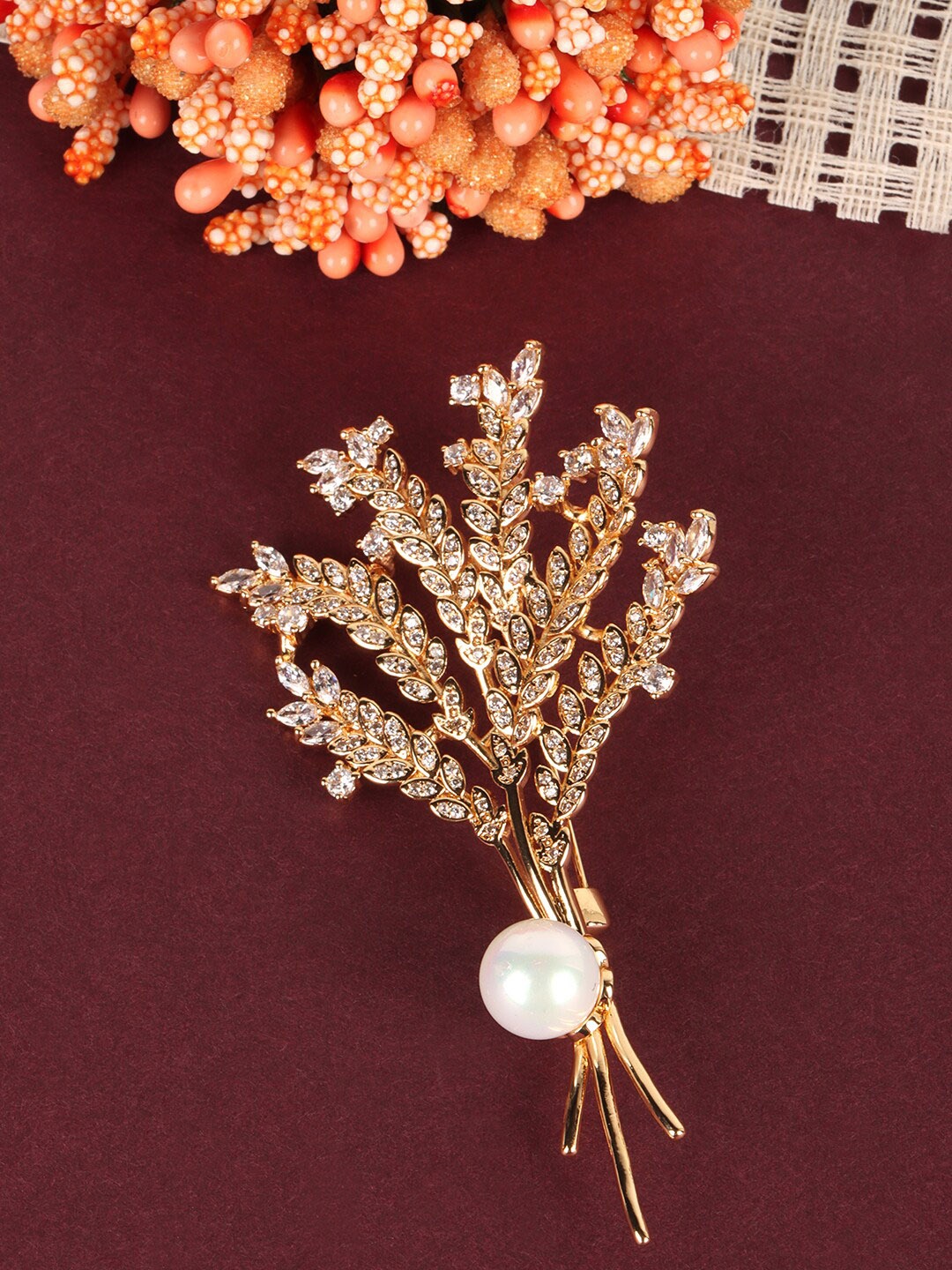 

JEWELS GEHNA Women Gold-Plated White CZ Studded Saree Clip