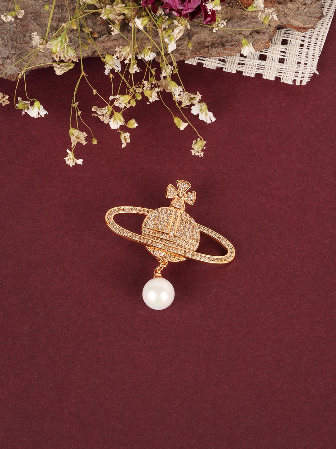 

JEWELS GEHNA Women Gold-Plated White CZ-Studded Saree Clip