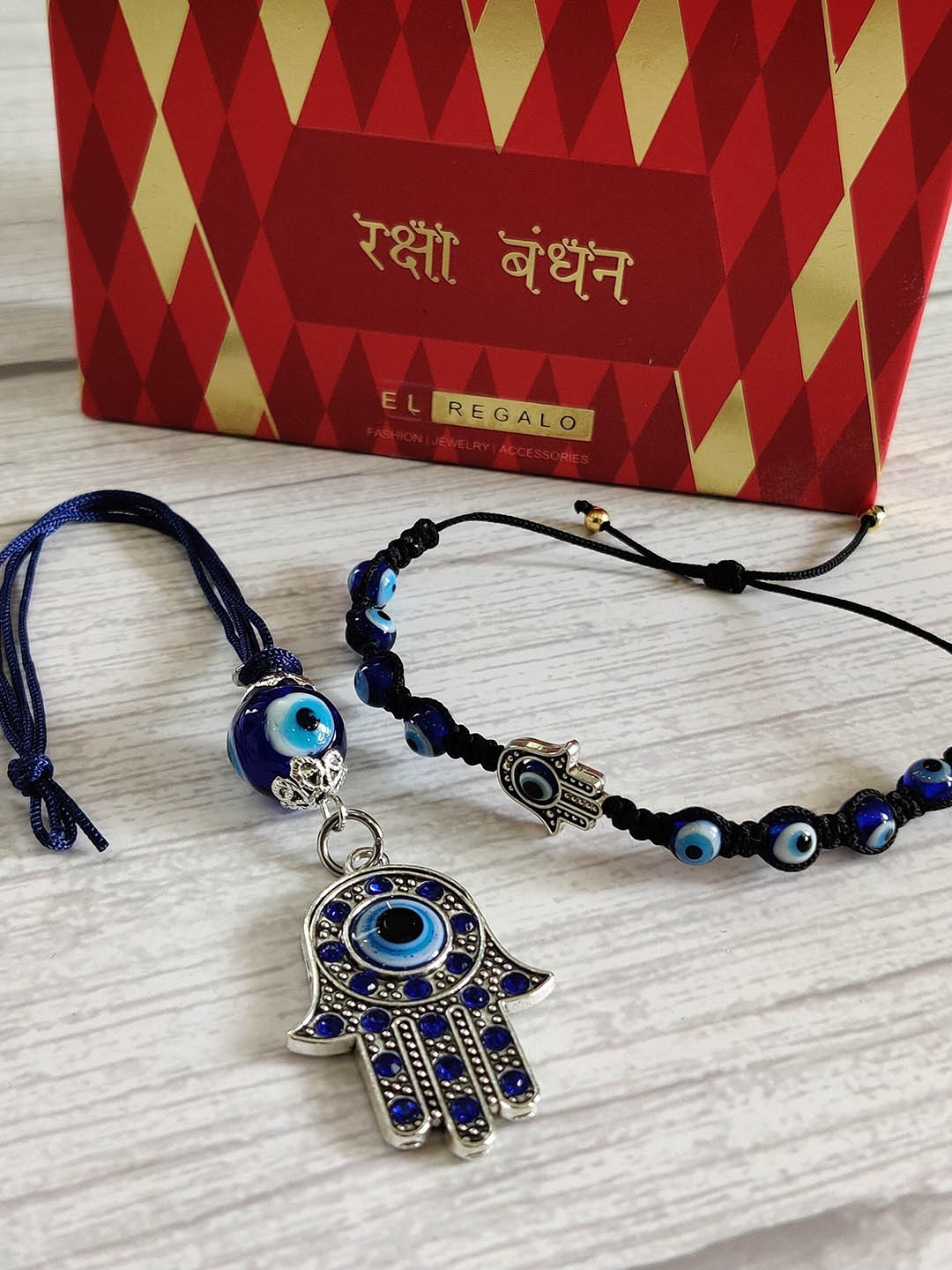 

EL REGALO Pack of 2 Silver-Toned Hamsa Rakhi