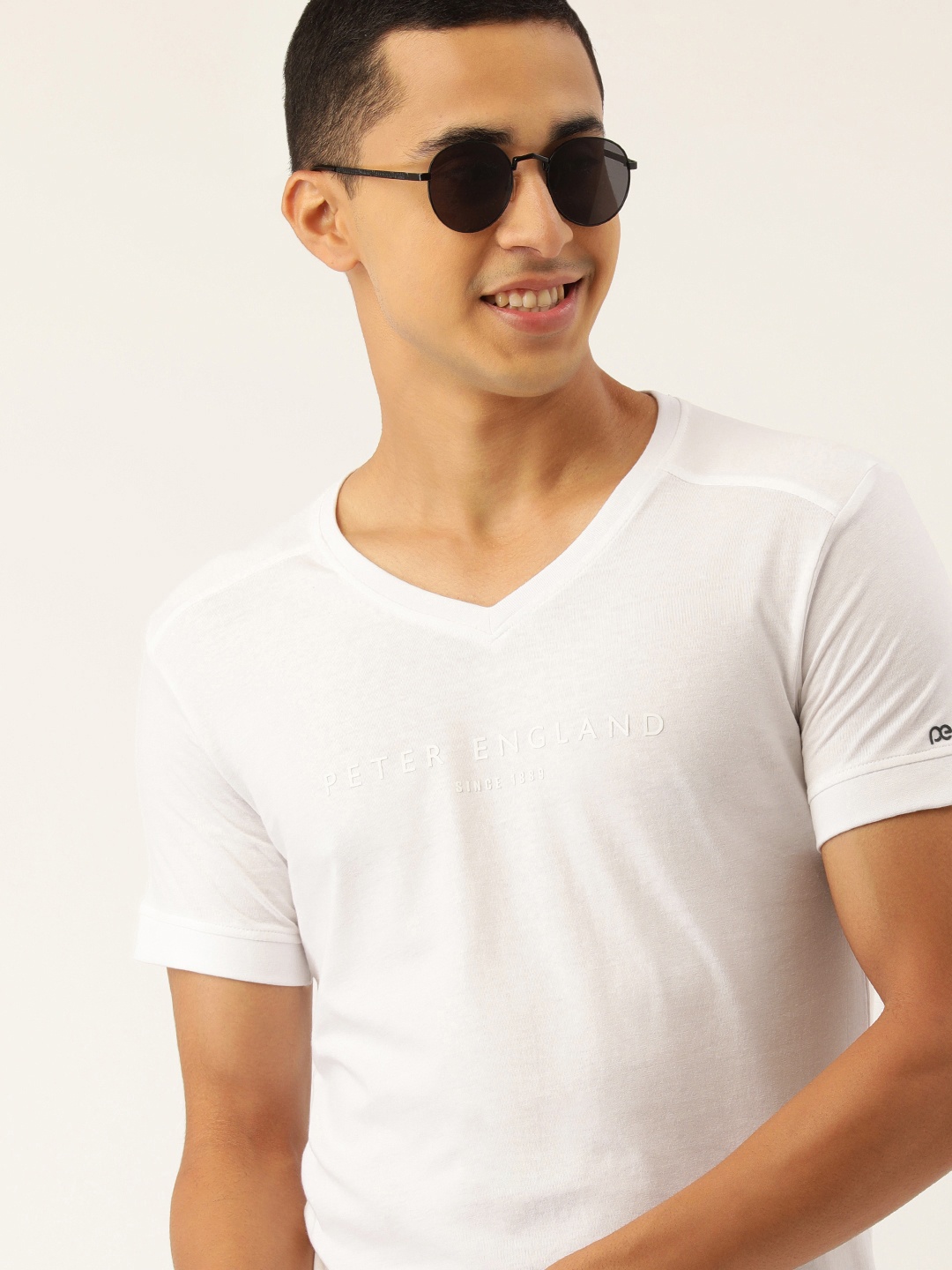 

Peter England Casuals Men White Solid T-shirt