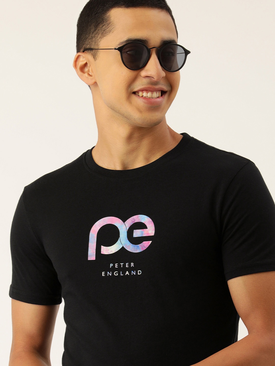 

Peter England Casuals Men Black Brand Logo Printed T-shirt