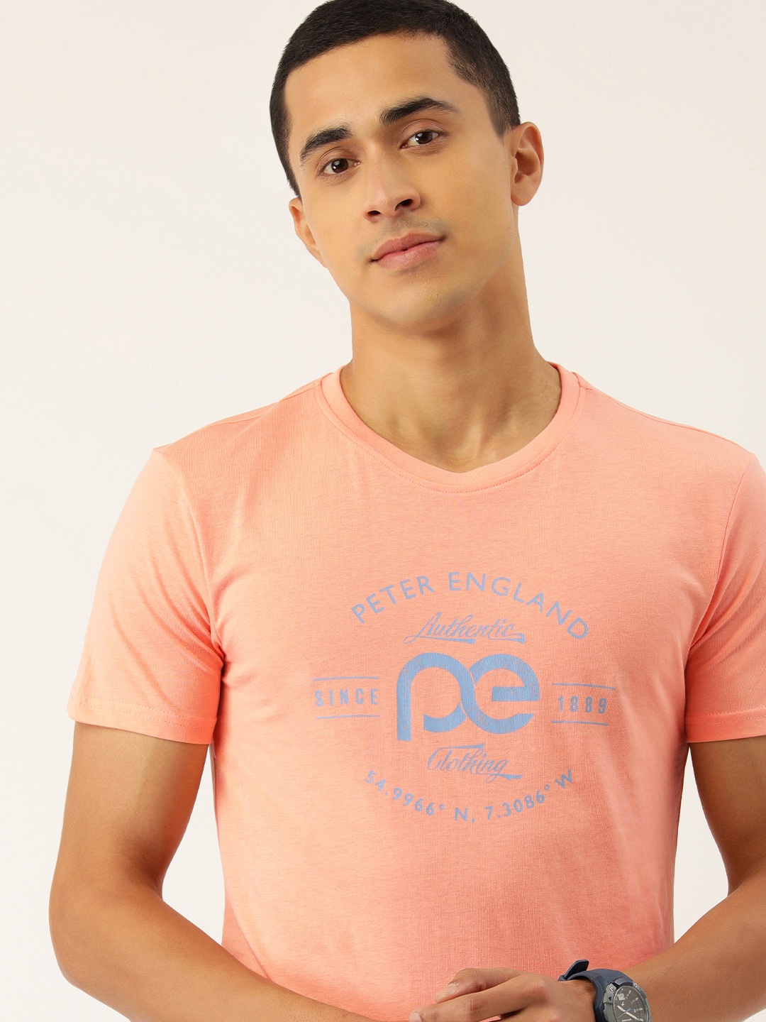 

Peter England Casuals Men Peach-Coloured & Blue Brand Logo Printed T-shirt